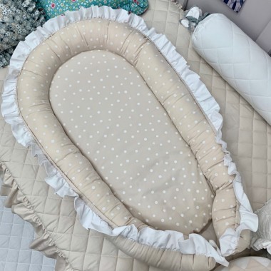 Kokon niemowlęcy doskonale otula maleństwo do snu. Gniazdko pozwala dziecku poczuć się bezpieczniej w łóżeczku dzięki zmniejszeniu jego powierzchni.