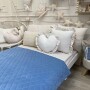 Niebieska pikowaną narzuta na łóżko do pokoju dziecka uszyta z aksamitu- velvet
