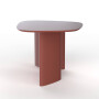 Duży, koralowy stół o owalnym kształcie - kompozycja elegancji i nowoczesności.