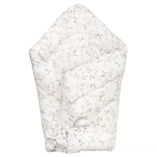 Biały bambusowy rożek niemowlęcy w delikatne gałązki i listki.